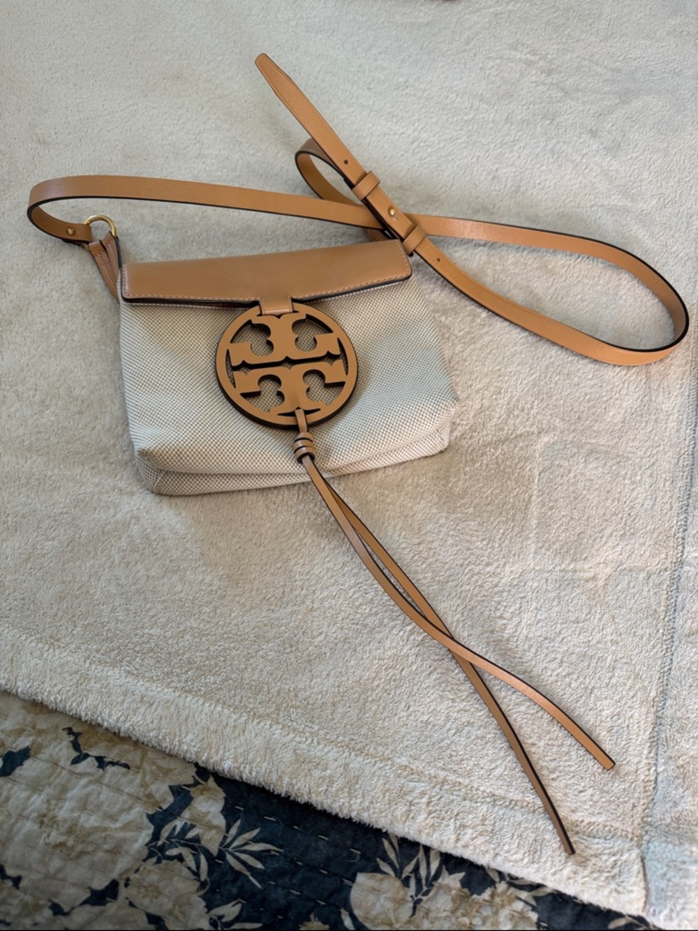 Tory Burch Beige Canvas and Tan Leather Crossbody with Logo Tassel.